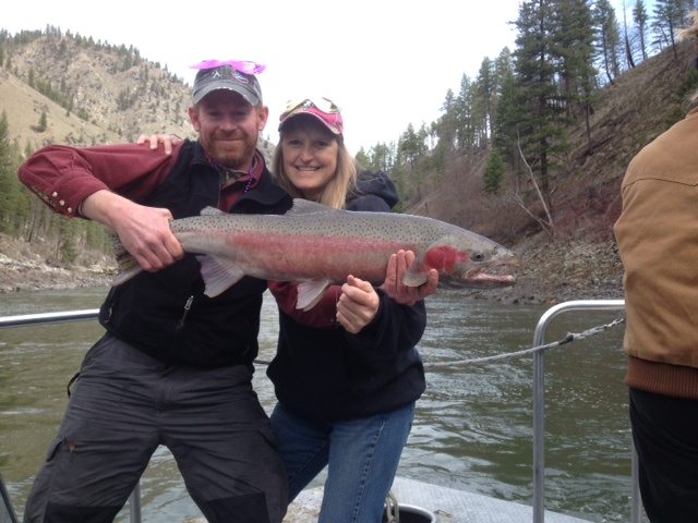 Denise catches a nice wild one on the river today,