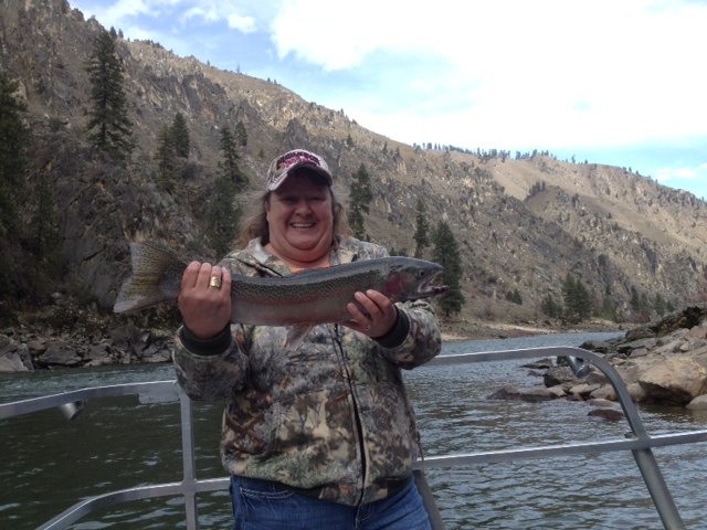 Chris Johnson is shown here with her nice 24" fish.